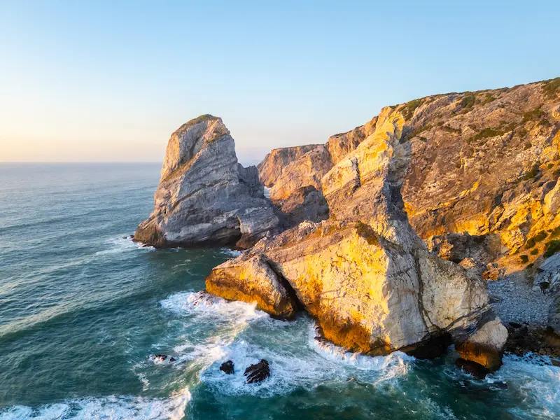 Cliffs Near Ursa Beach At Sunset Portugal Aerial